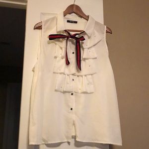 White, navy blue, red ruffled short sleeve shirt